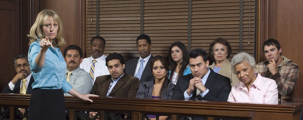 Photo of prosecutor with jury in court