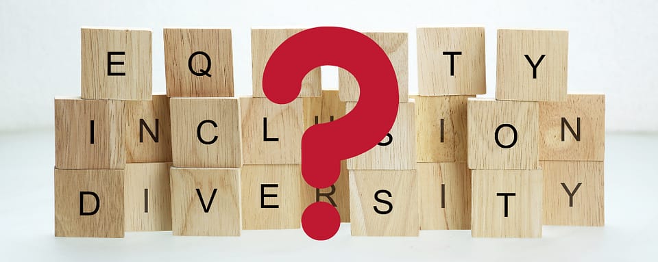 Photo of blocks spelling the words Equity, Inclusion, and Diversity behind a red question mark